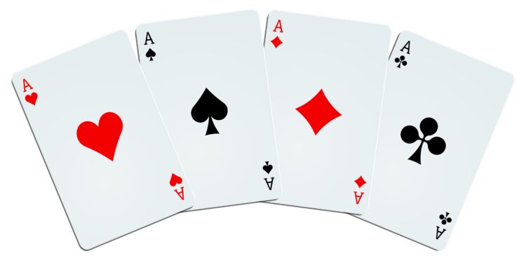 Quatre as isolés sur fond blanc